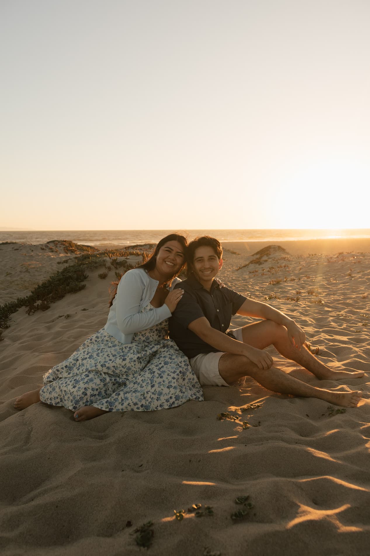 Nicolas and Alexandra on the beach at sunset